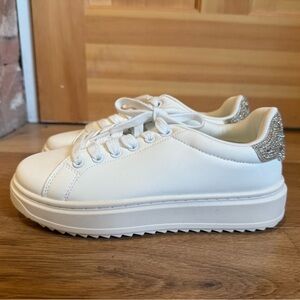 Platform white sneakers with rhinestone gems